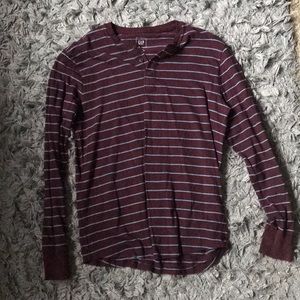 Striped blue and maroon GAP shirt.